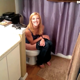 Some guy barges in on his blonde girlfriend as she takes a shit sitting on a toilet. No poop action is seen, but some very subtle pooping sounds can be heard at the exact start of video. Presented in 1080P vertical HD format. Over a minute.